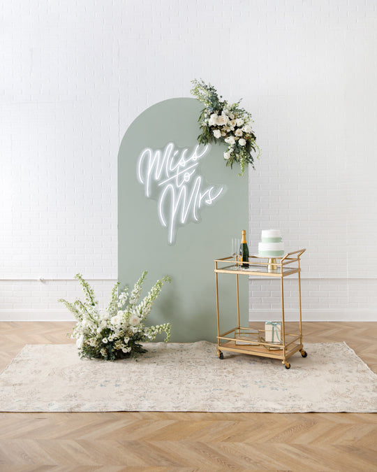 Sicilian Sips - Bellamy Panel with Floral Arrangements and Neon Sign