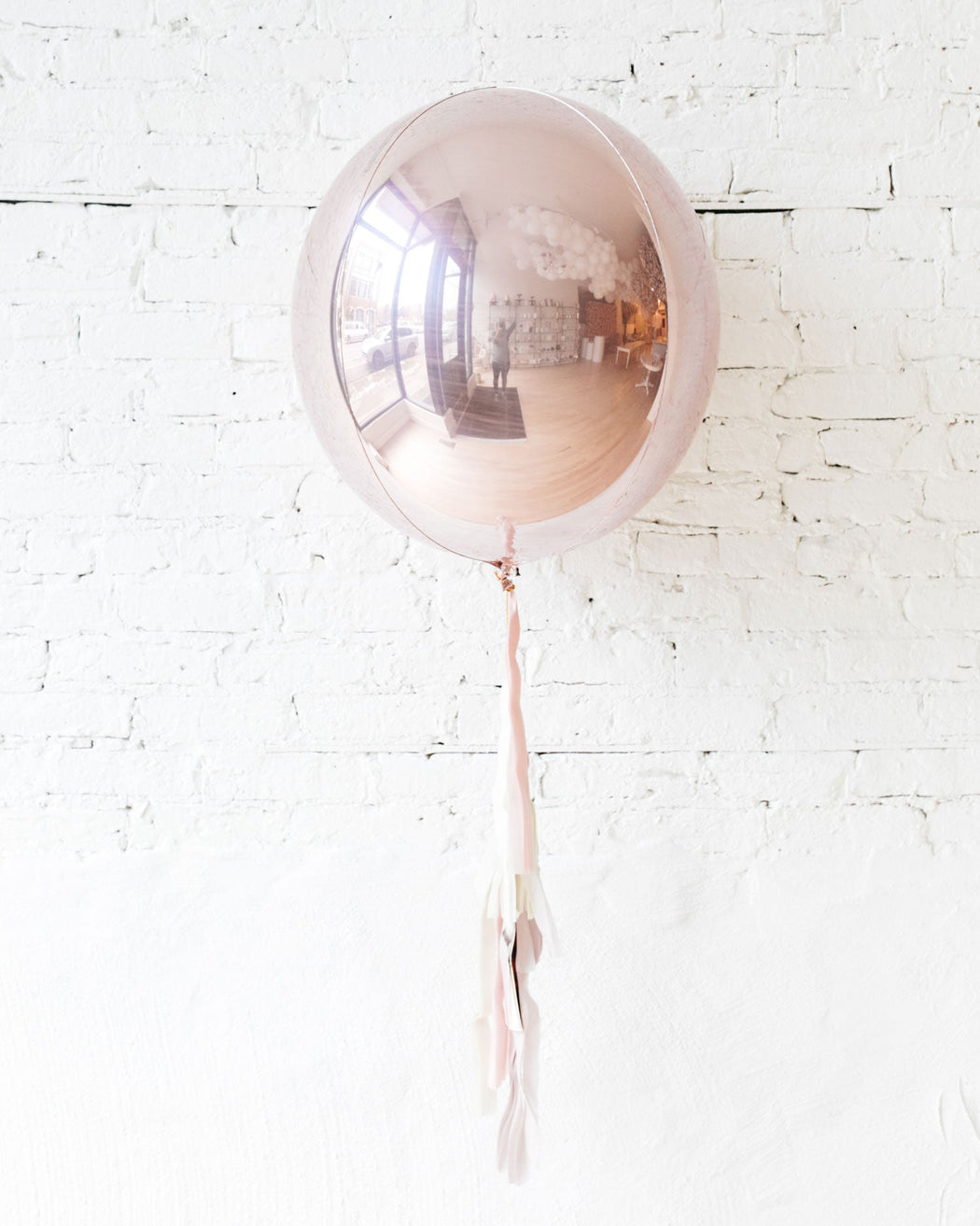 Rose Gold Orb with Tassel Close up