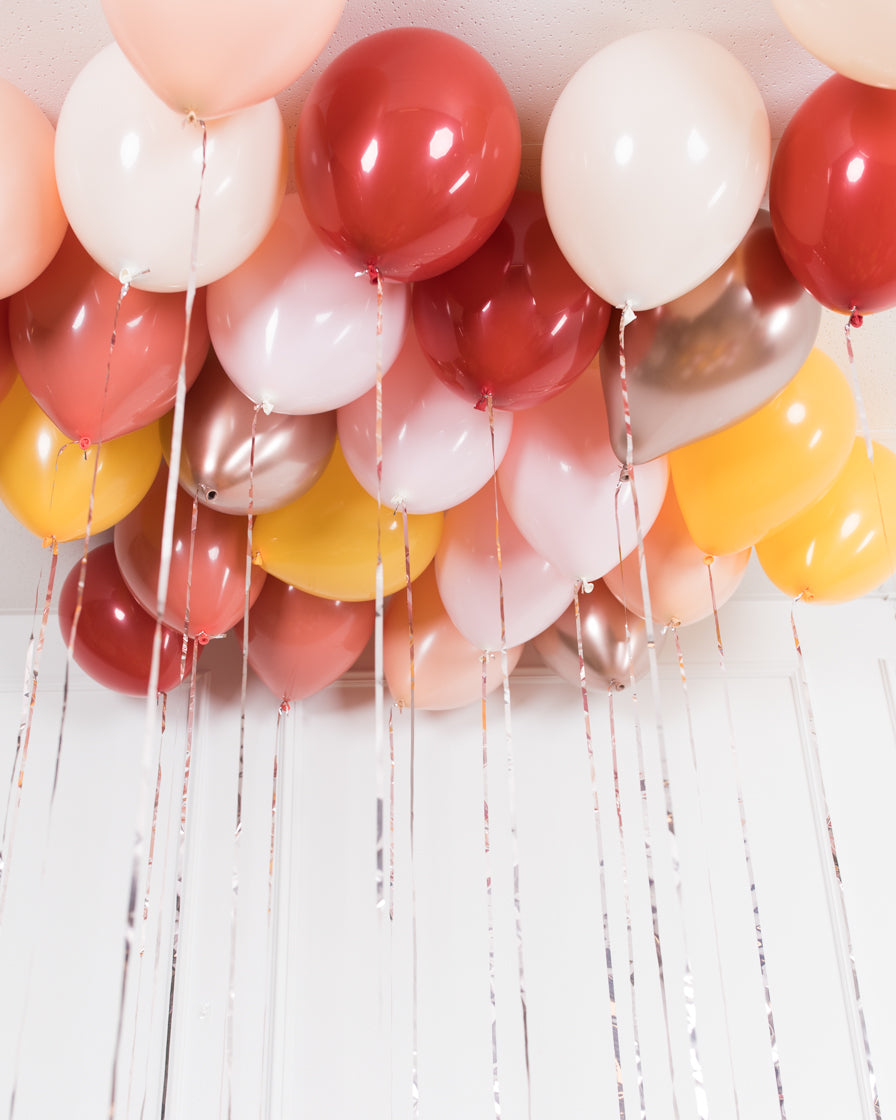 bohemian-birthday-balloon-coral-pink-ceiling-floor-party
