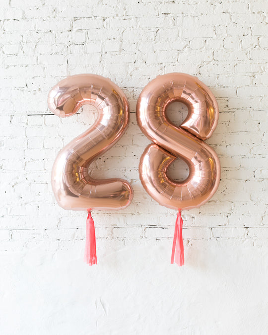 34in Rose Gold Foil Numbers with Coral Skirts