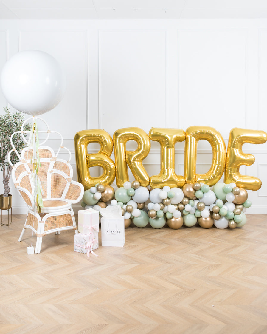 botanical-theme-bride-bouquet-balloon-pedestal-gold-white-grey-sage