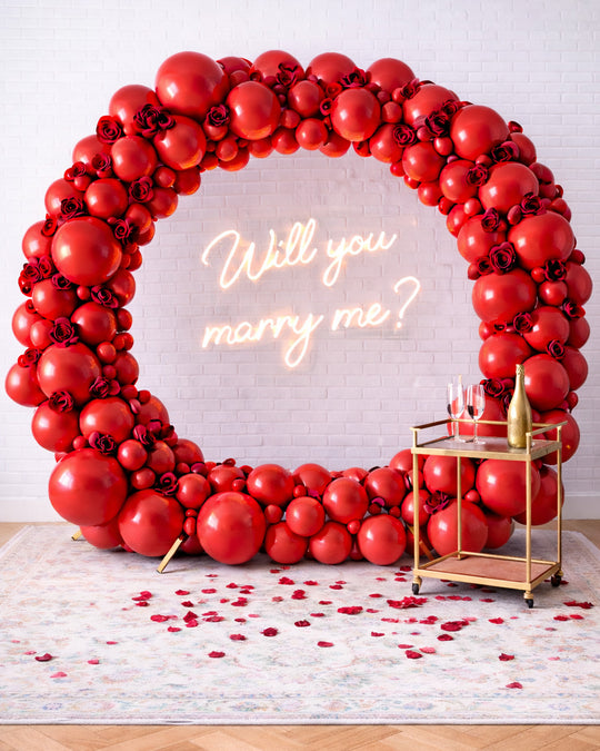 Valentine's Day - Circle Frame with Florals and Will You Marry Me Neon Sign
