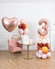 bohemian-birthday-balloon-coral-pink-number-column-party