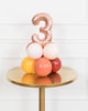 bohemian-birthday-balloon-coral-pink-number-tabletop-party