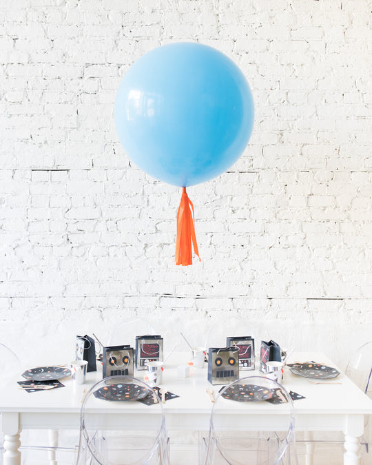Pale Blue Giant Balloon and Orange Skirt Centerpiece